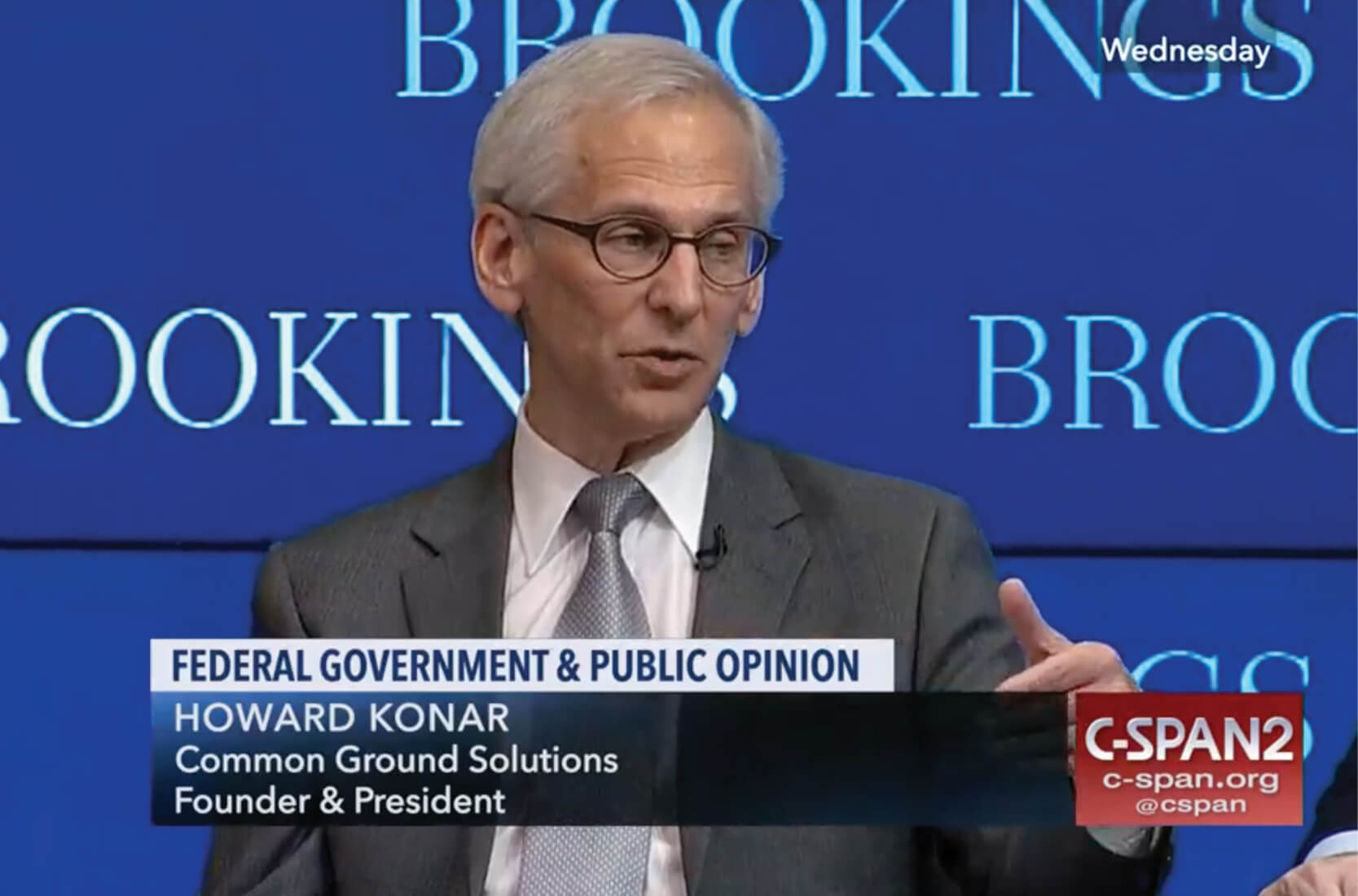 Howard Konar speaking to crowd at Brookings panel discussion